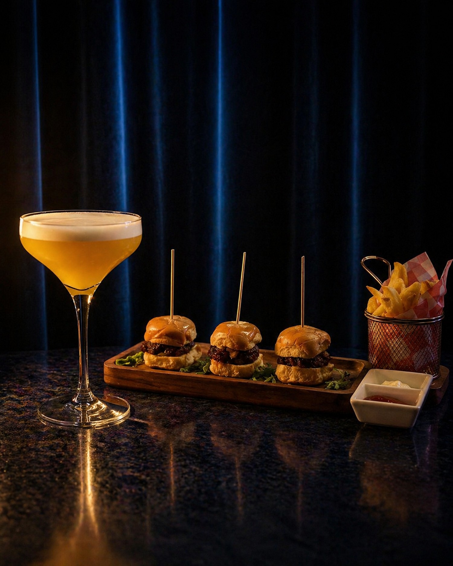 Sliders trio with fries and a coupe cocktail